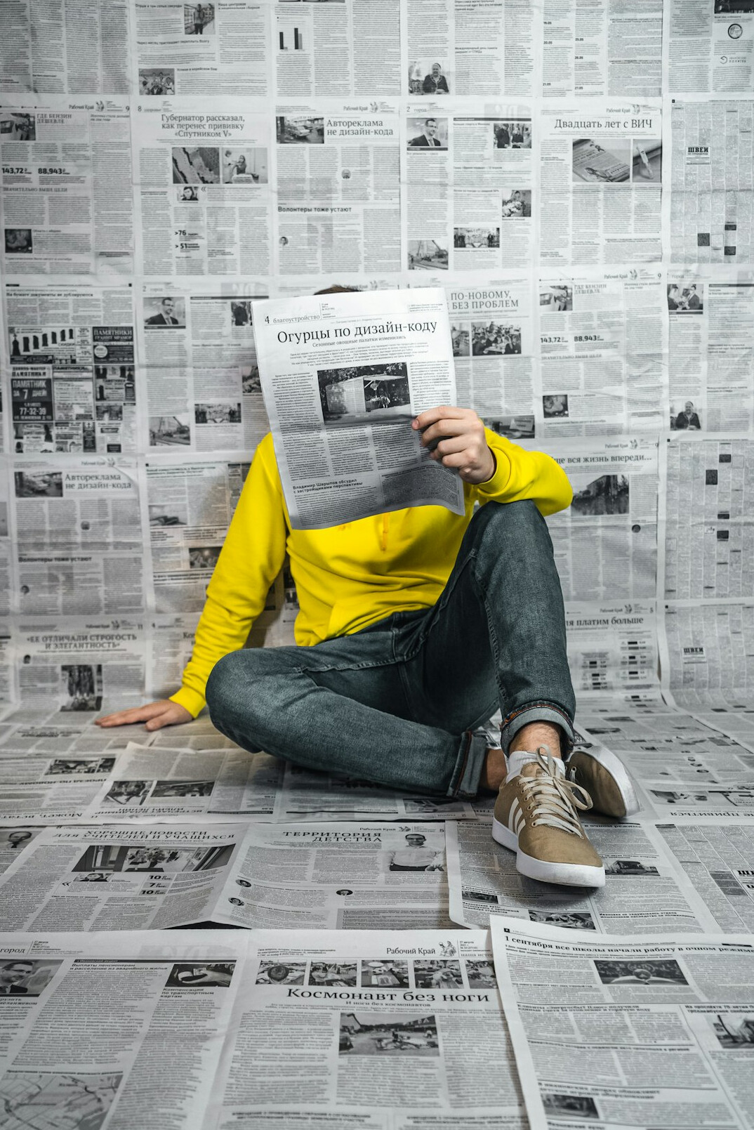 person reading newspaper